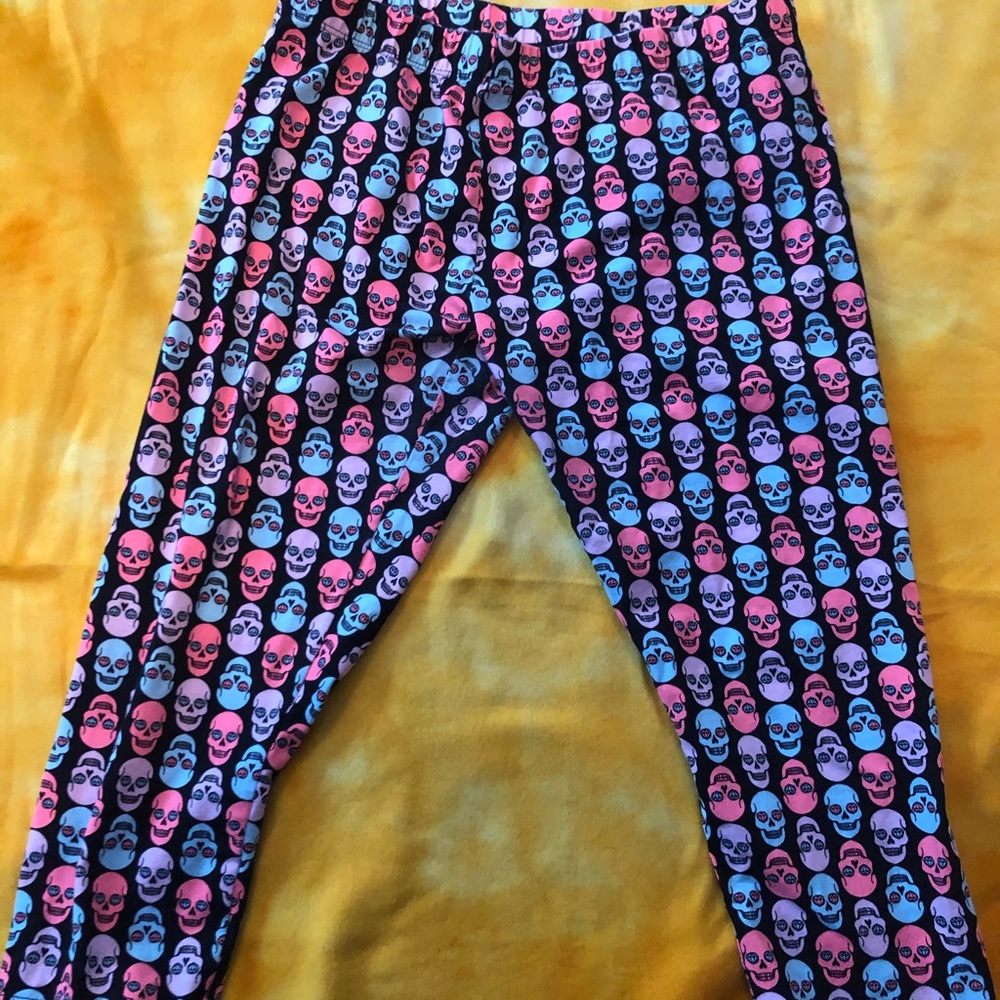 black leggings with a colored skull pattern